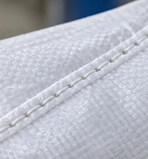 Close-up of a sewn PP woven bag seam showing stitch quality