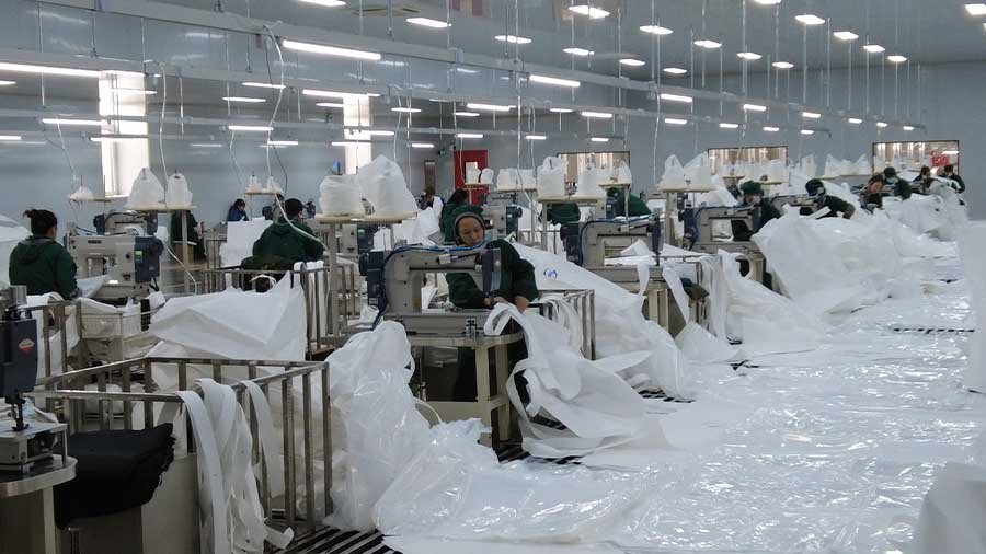 FIBC bulk bag sewing production line in manufacturing workshop