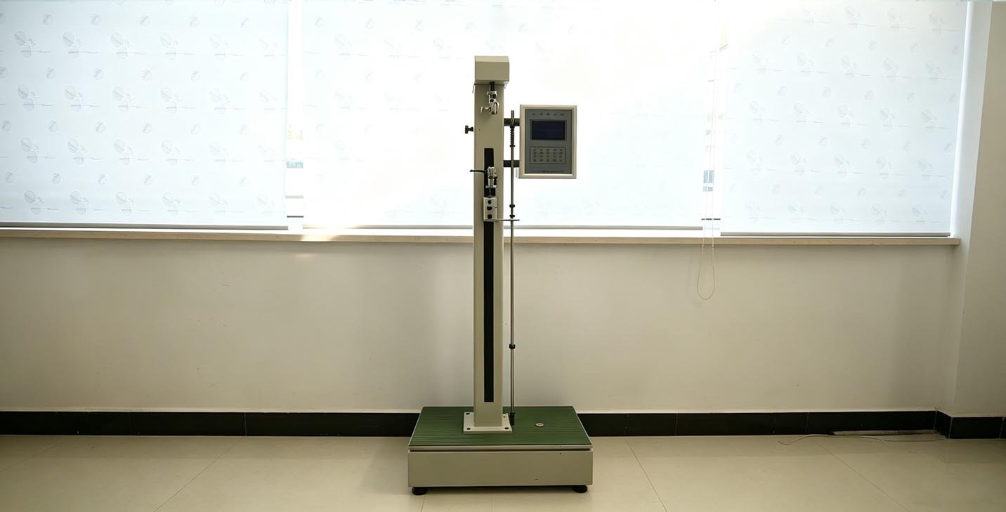 Single column electronic tensile testing machine used to test the tensile strength of PP woven fabric, webbing, and FIBC bag materials.