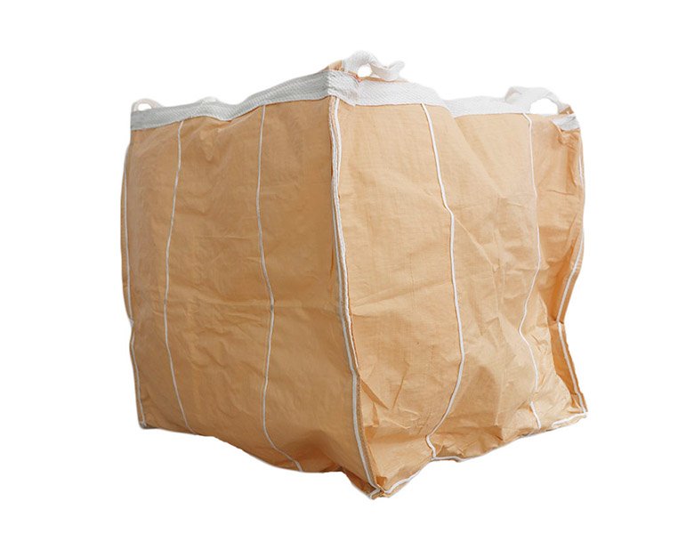 FIBC bag with fill spout top and discharge spout bottom for bulk material handling