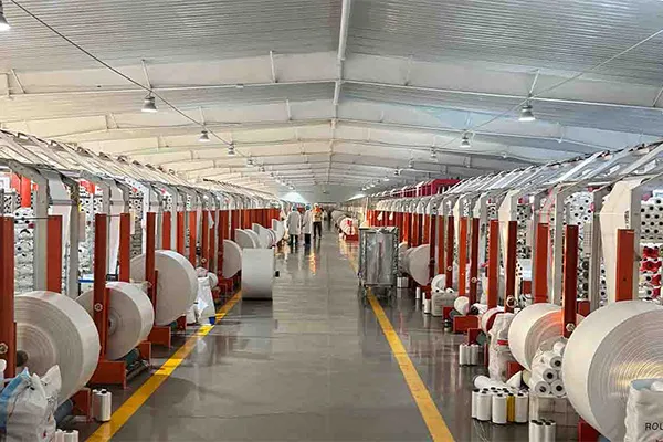 Large circular weaving workshop for PP woven bag production